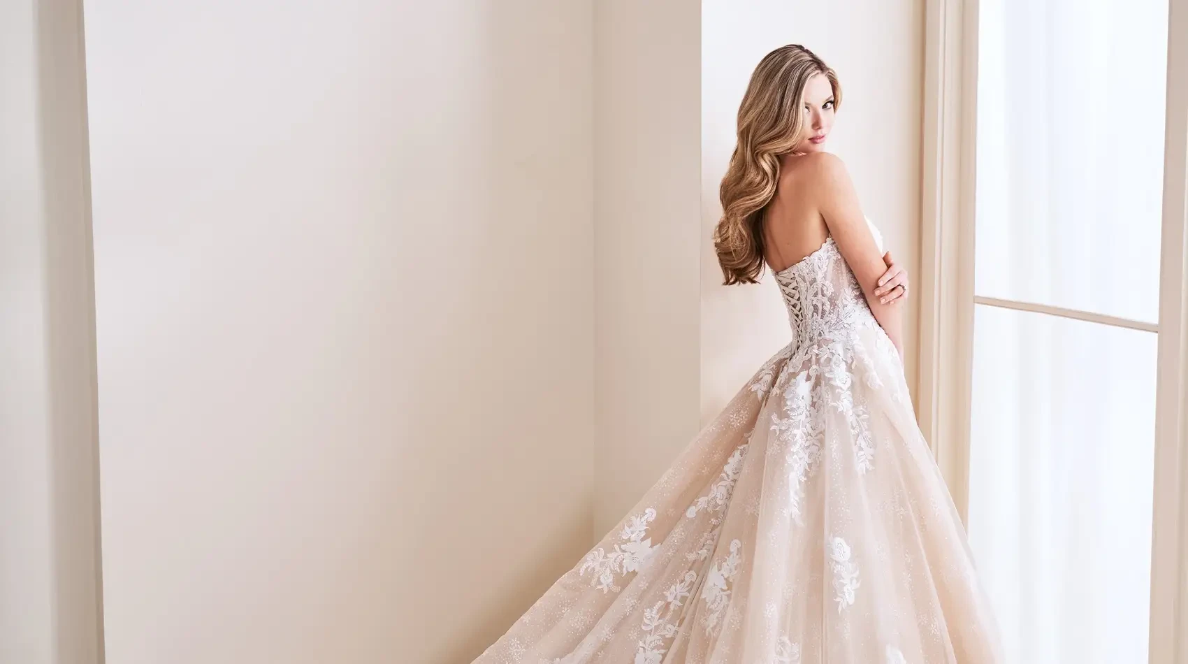 Photo of the model wearing a bridal gown